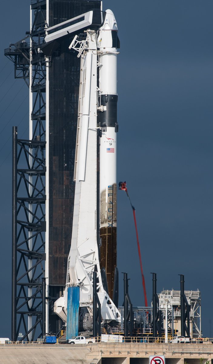 NorminalNews's tweet photo. SpaceX pad teams are currently spraying the companies newest Falcon 9 with artificial soot ahead of its maiden flight on Thursday.

SpaceX has said: "Some customers have become wary of flying on un-flight tested boosters, we hope this new paint scheme will help to reassure them!" https://t.co/OolSv6euGU