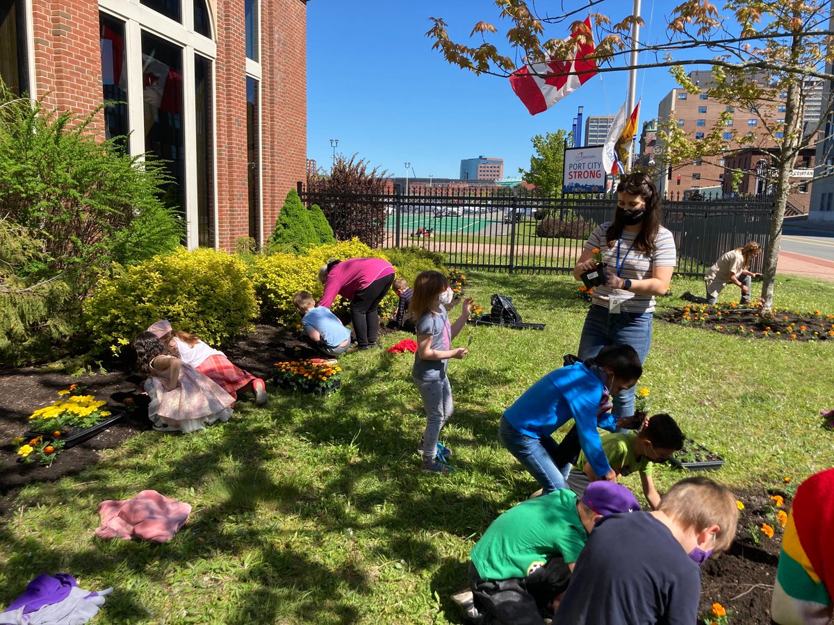 SJBKE_School's tweet photo. So happy to take part in Marigold planting again after a COVID hiatus last year!  Thanks to our partners @PortSaintJohn and to Barry Ogden for making this happen.  #grateful #marigolds https://t.co/DVABRBJ8Zc