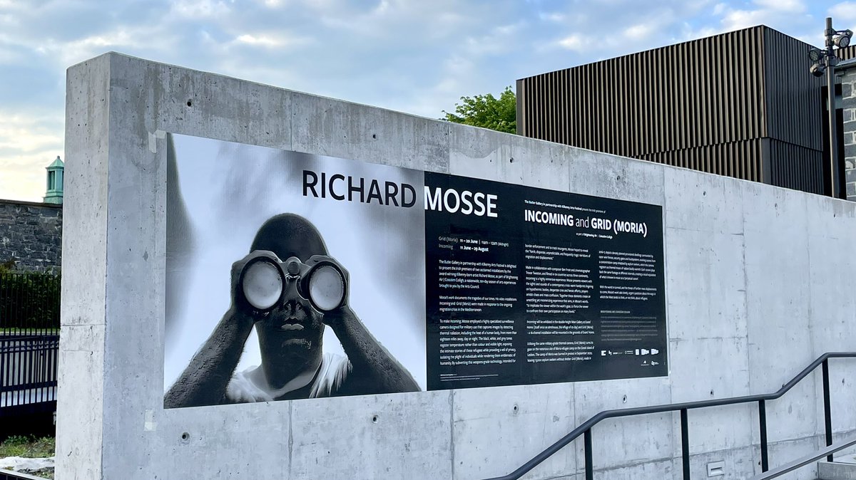dynamitedesign's tweet photo. Wall wrap by Dynamite at the Butler Gallery, Kilkenny. Upcoming exhibition: Richard Mosse ‘Incoming &amp; Grid (Moria)’, from Jun 11 - Aug 29. Installers just missed the ☔️. @butlergallery @KilkennyArts @richard_mosse https://t.co/vWW3TljuNh