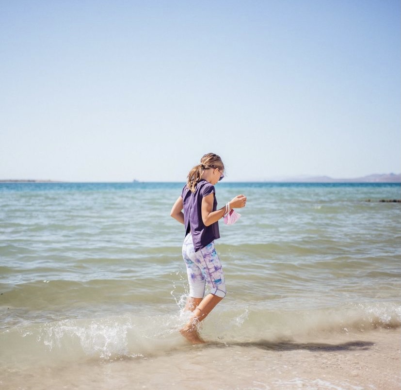 Two of our favourite things! The beach and our new Split Back Tee! @travelswithtwointow
