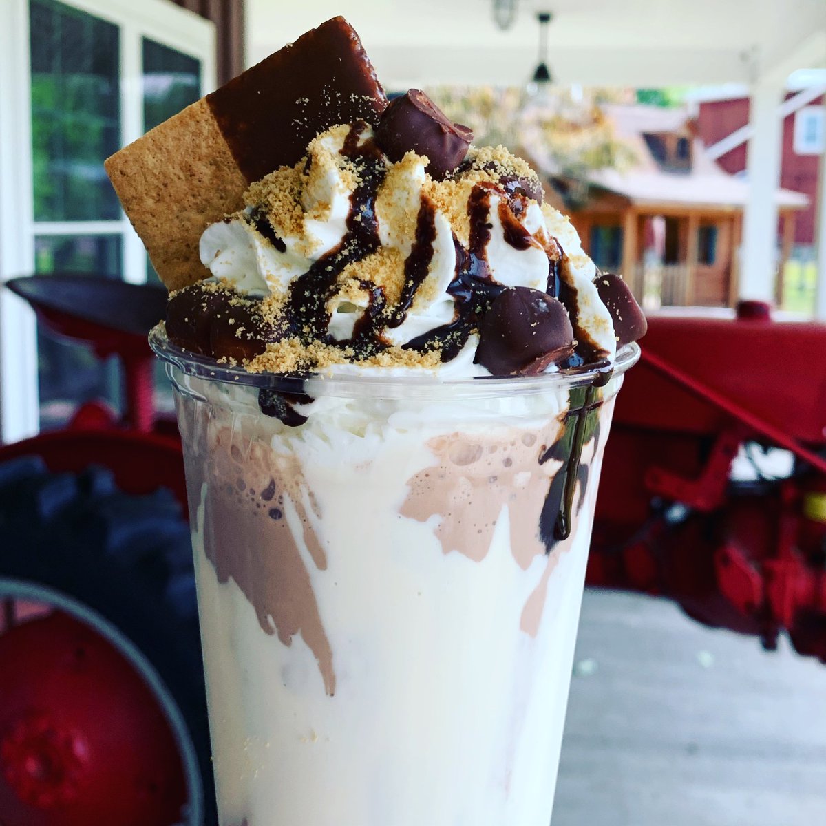 June Shake of the Month!  
Chocolate shake poured in a marshmallow cup topped with whipped cream, graham cracker pieces, chocolate covered mini marshmallow, chocolate drizzle &amp; a chocolate dipped graham cracker!