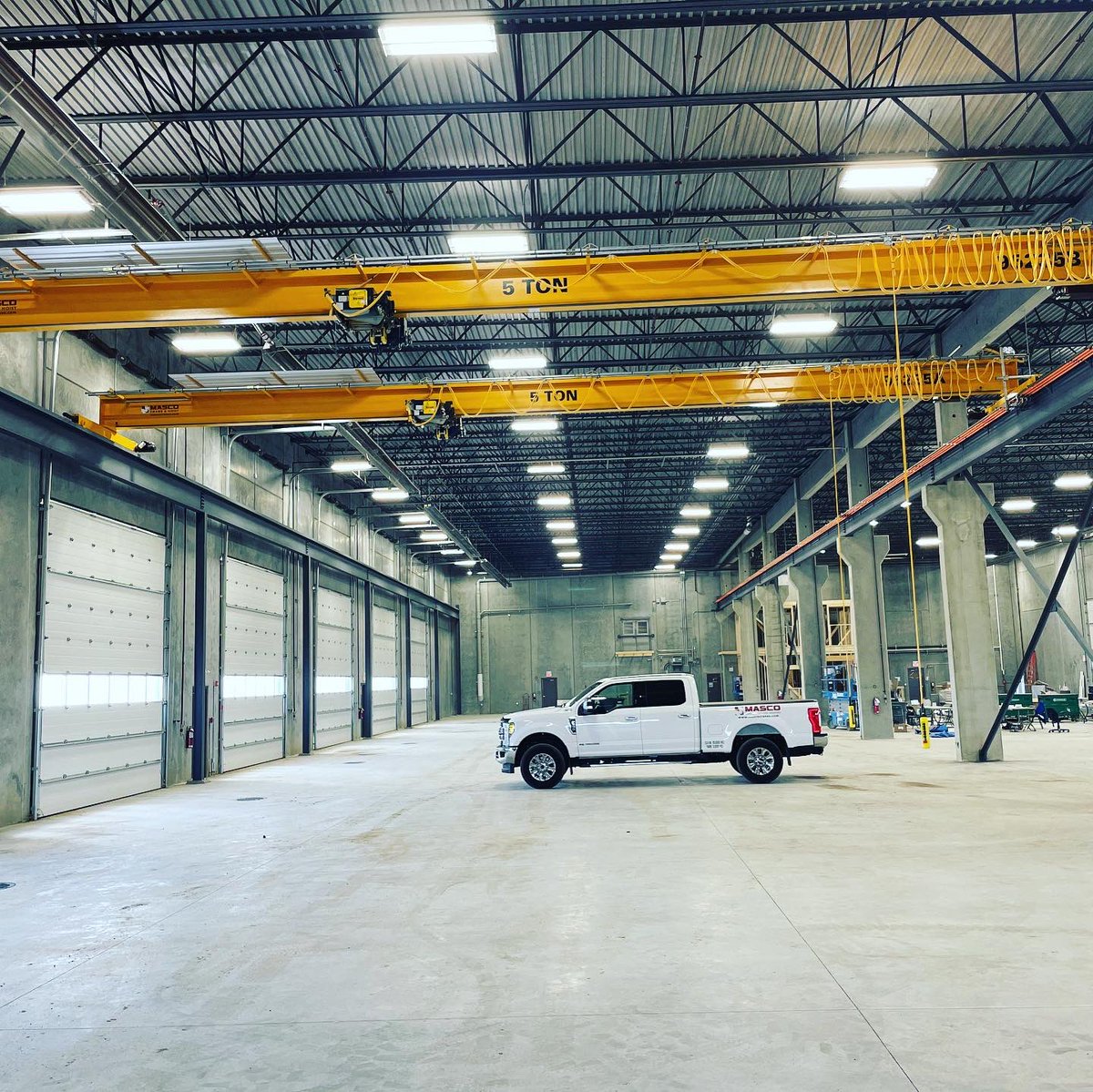 MascoCrane's tweet photo. Two more 5 Ton Cranes Load Tested and installed in Nisku, Alberta last week. These cranes are both fitted with @StreetCrane ZX6 Wire Rope Hoists. #bridgecranes #hoists https://t.co/hV5rygFzJ5