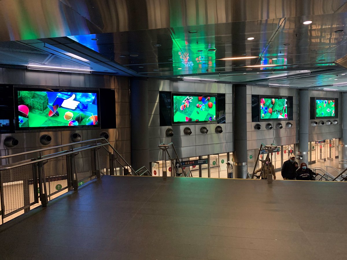 MTAArtsDesign's tweet photo. Jay Rhee’s new digital artwork “Handcrafted Reality” explores the human relationship with digital screens and notions of virtual space. The site-specific work is presented on 52 screens for 2 mins at the top of each hour at #FultonCenter. https://t.co/sVA3OnkFs1 https://t.co/SwGz2kIHhK