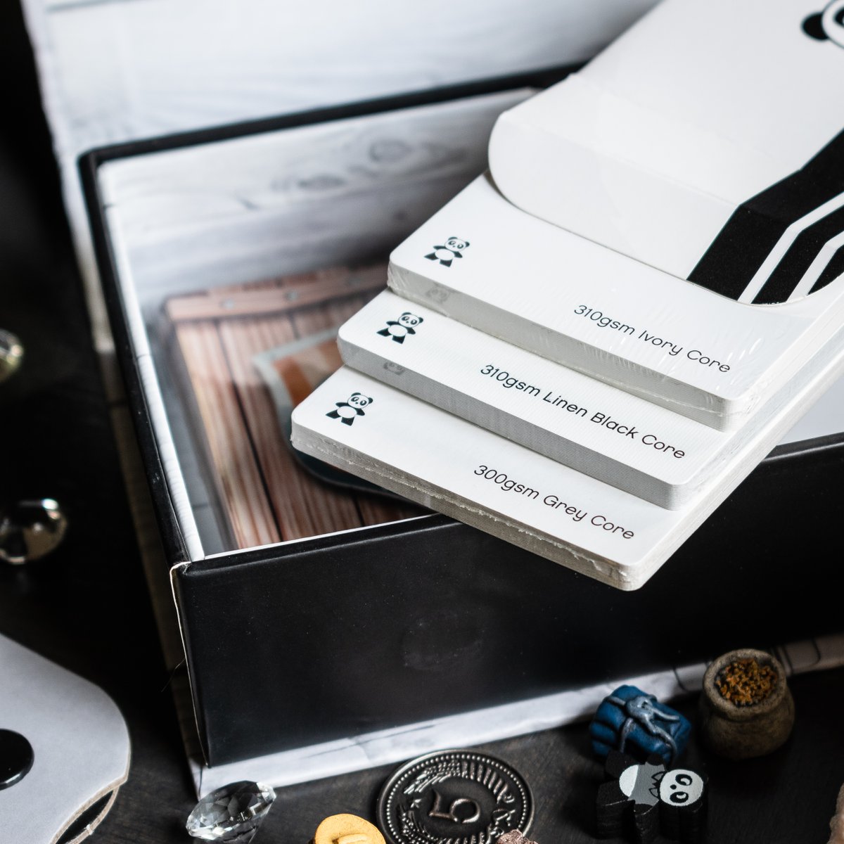 pandagm's tweet image. Many years ago, Panda pioneered making #pandatoolkits so people could get a good look and feel for our component quality. Since then, toolkits have become a standard in the industry. Our 2017 toolkit included resin &amp;amp; plastic pieces from a few games. Any you recognize? :)