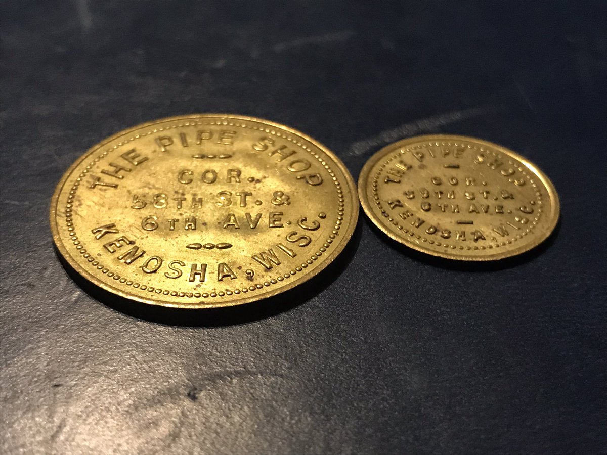FavoriteCoins's tweet photo. The last of my token purchases for the day are these two “The Pipe Shop” tokens from Kenosha, WI. I wonder what I could have purchased when these were traded 🤔. #pipe #token #pipeshop https://t.co/AHajuvGFeD
