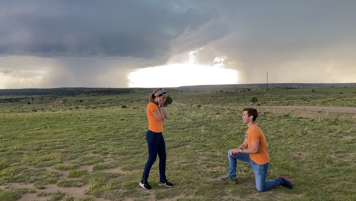 RayaMaday's tweet photo. As the tornado touched down, so did his left knee. Iโm still floating on cloud 9 โ (or in this case, a cumulonimbus) #tornadoproposal #accuweather #stormchasing #epicproposal @TomBedardWx https://t.co/m6PIBL4Xxe