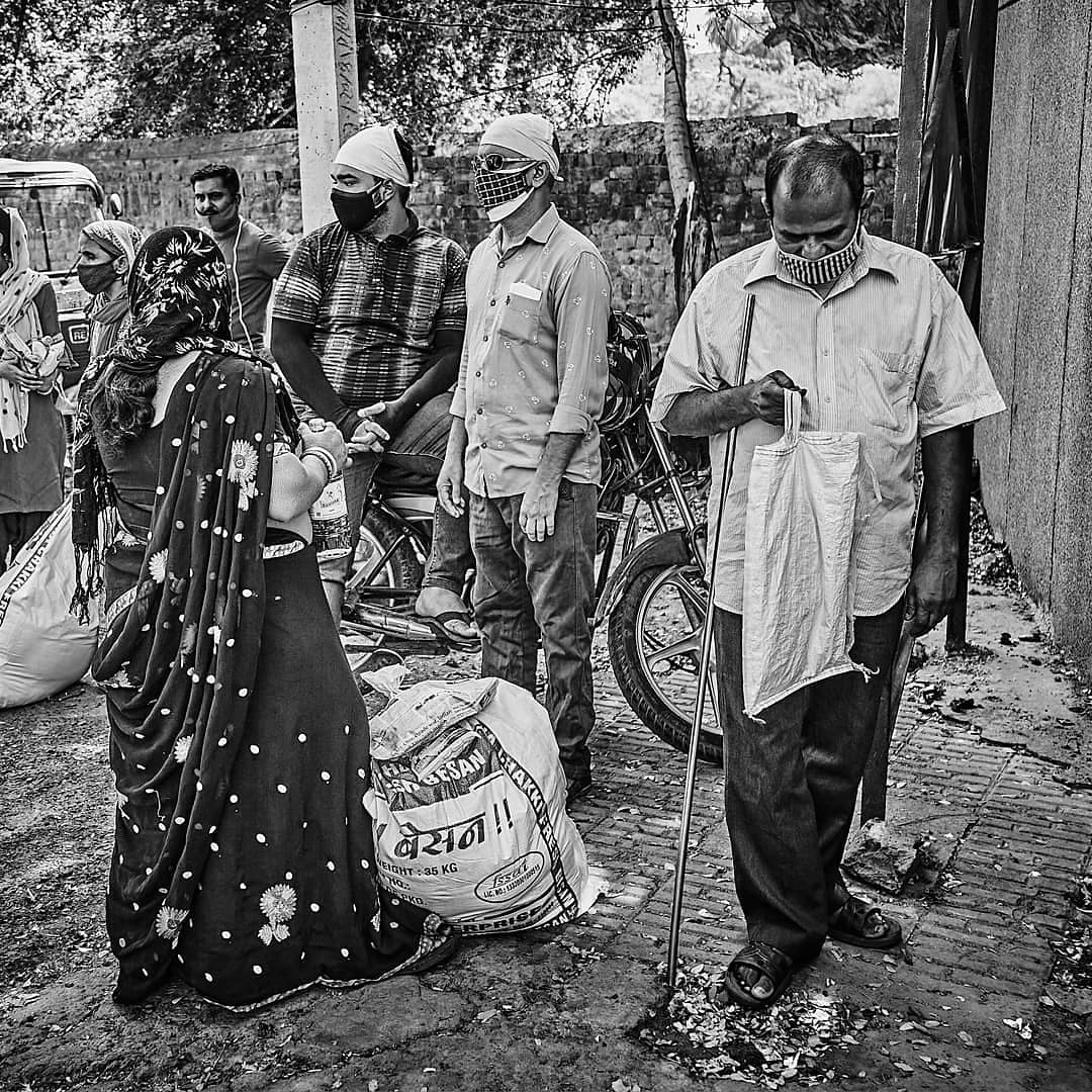 DrMPuri's tweet photo. During our food distribution (thanks to @GiveIndia ), our in house photographer was able to take many photographs. 
Here are some Black&amp;White photos of the people.

#giveindia #blackwhitephotography #portraitphotography #covidreliefindia #disabilitylife https://t.co/1JWvyZjOhi