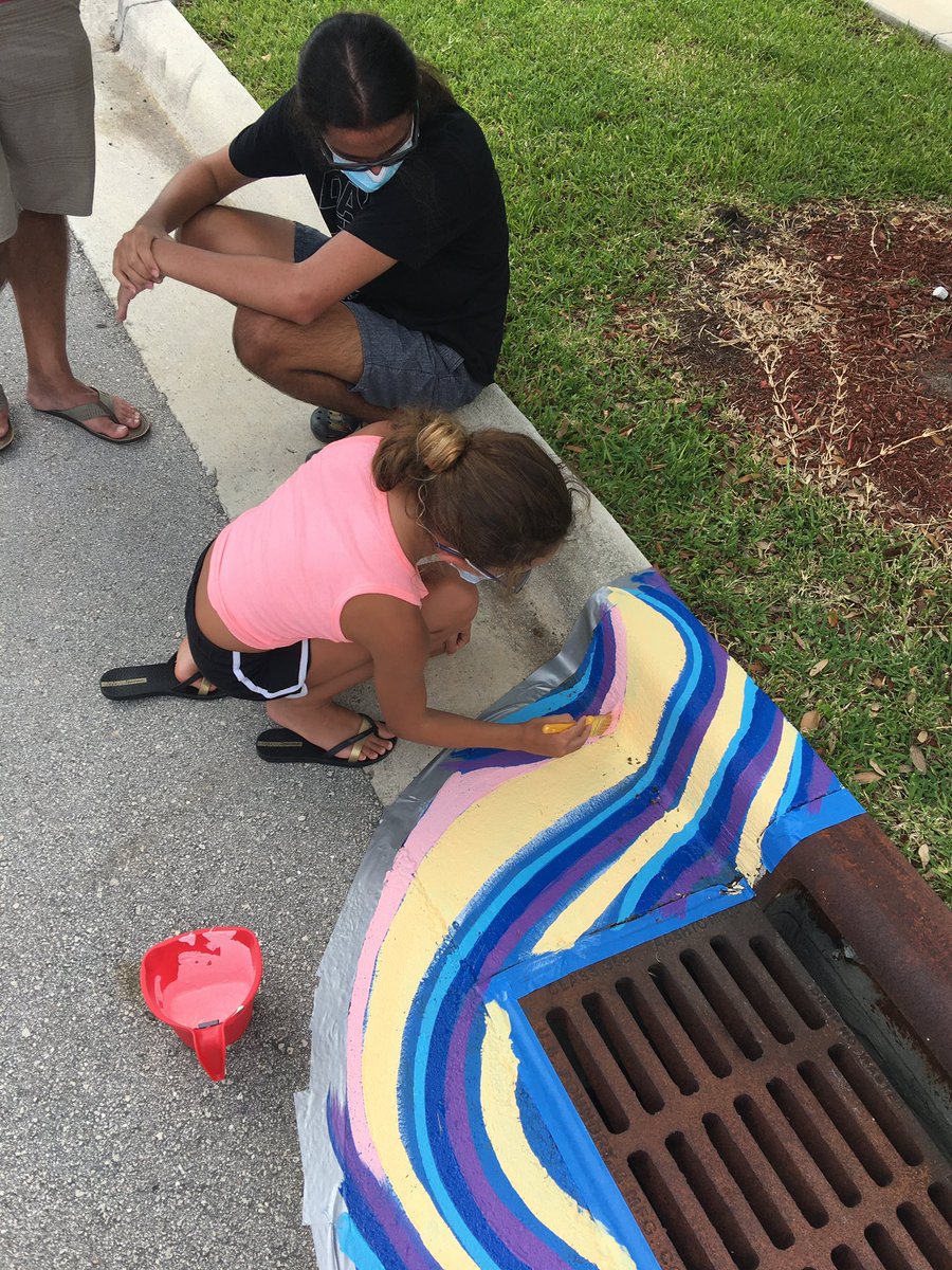 #PCVisualArts instructor Patricia Knight and Liam Riesz #PC2023 were a few of the volunteers in Pompano Beach helping to bring a public arts project to life! Liam is one of five #PCUpperSchool artists who had work selected for the project. #PCNurturing