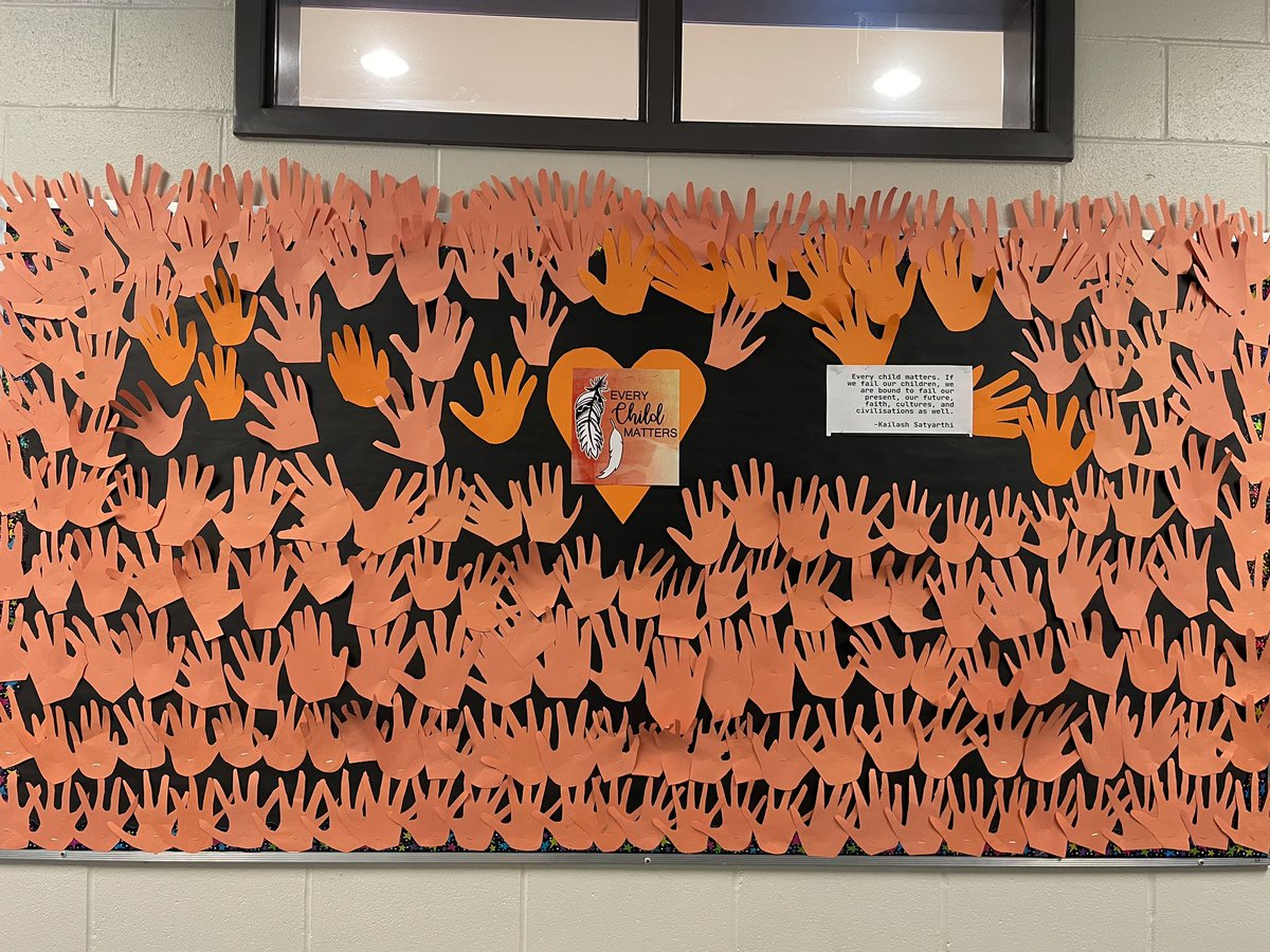 Every child matters...215 small orange hand prints to honour the children. #OrangeShirtDay , #everychildmatters ,#grade5 , @ElizabethParkEl ,<a href="/NLESDCA/">NLESD</a>