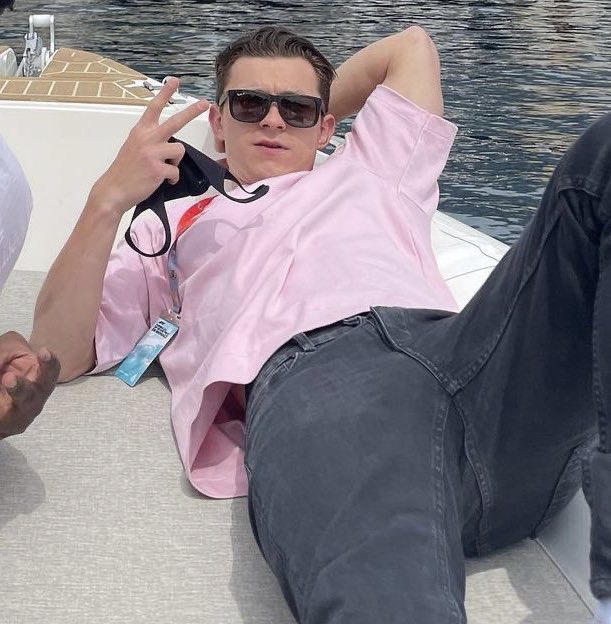 tom holland posing like this is doing things to me