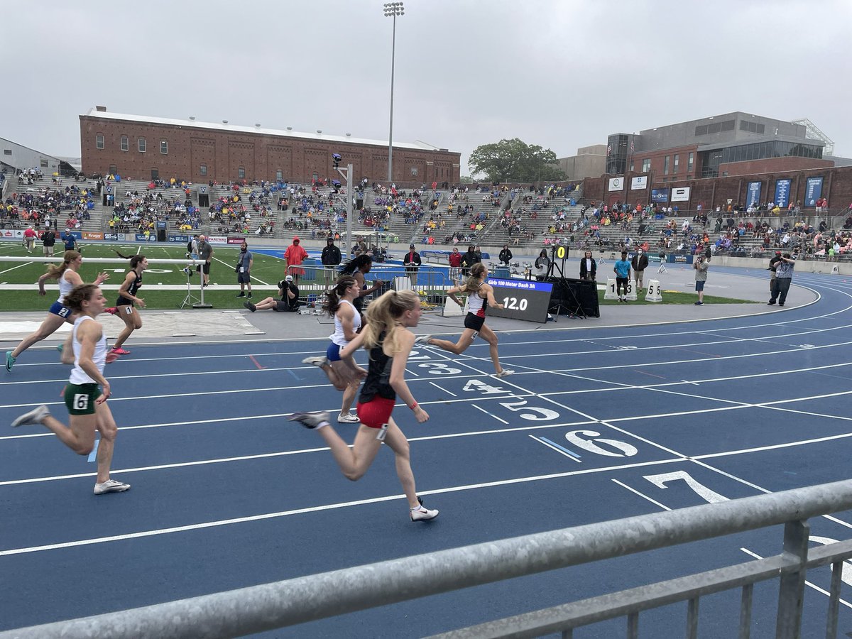 Biermann with her 3rd gold medal of the weekend in the 100m with a school record 12.37!