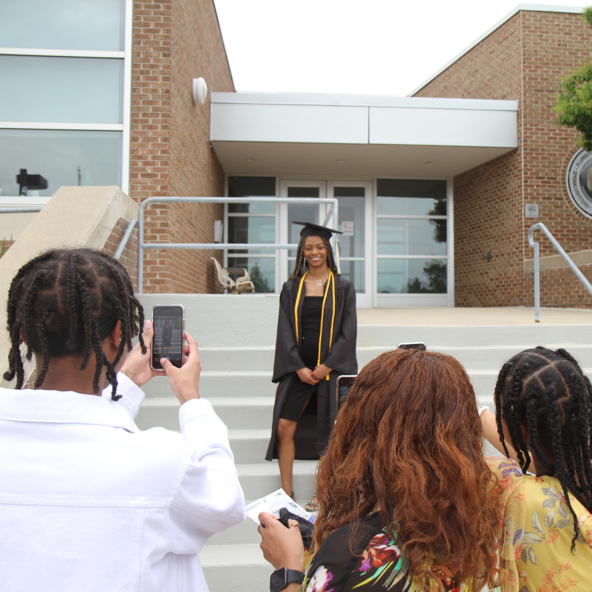 washtenawcc's tweet photo. Torrie Huddleston, who earned a Medical Assisting certificate, is the focus of her family at today's Commencement Parade &amp; Celebration.

#WCCGrad #WCCProud https://t.co/sxPqU0CRkV