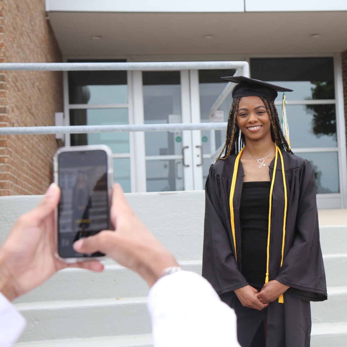 washtenawcc's tweet photo. Torrie Huddleston, who earned a Medical Assisting certificate, is the focus of her family at today's Commencement Parade &amp; Celebration.

#WCCGrad #WCCProud https://t.co/sxPqU0CRkV