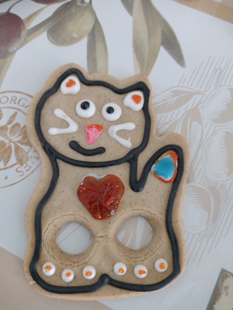 Loving the gingerbread kitty from @CostaCoffee but my 7 year old couldn't help improving on it.