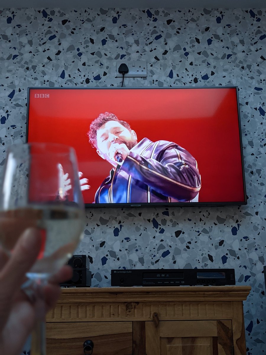 runninggin's tweet photo. Raising a glass to #terrywogan on song number 9. Good luck @JamesNewmanUk great effort! #Eurovision2021 https://t.co/kpbDr6Nyry