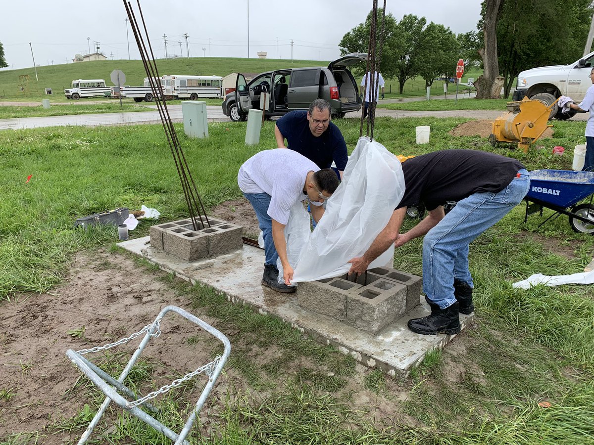 KsPrograms's tweet photo. Residents at Lansing Correctional Facility working diligently, with the masonry instructor, to put up stones for new signs for the satellite Career Campus. Thanks gentlemen! #BeatTheRain #SecondChancePell #CollegeInPrison #TalentPipeline #GivingBack #Workforce #PathwaysForSuccess https://t.co/glUZ9aNiOE