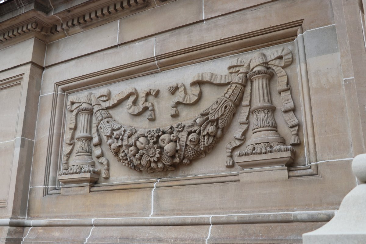 VicParliament's tweet photo. New photos reveal the skilful work of the stonemasons and other tradespeople working on the Parliament House restoration, as some of the scaffolding at the front of the building starts to be removed #springst https://t.co/6KRdfaGwqB