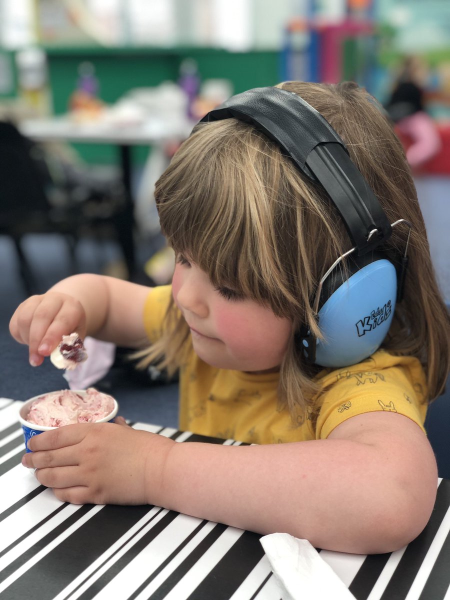 Evsie living the dream, soft play and ice cream.