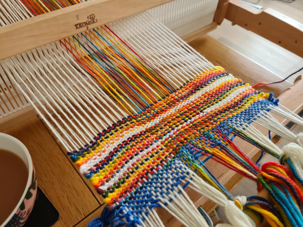 dtcrafts's tweet photo. First metre woven! A bit wonky but trying not to beat too firmly as it's for a drapy cowl. Also misjudged the meterage so need to wait until I"ve dyed up another rainbow skein before I can finish! 🙄😳 
#weaversofinstagram #weave #weaving #handweaversofinstagram #handdye https://t.co/TWqil0Kjfi