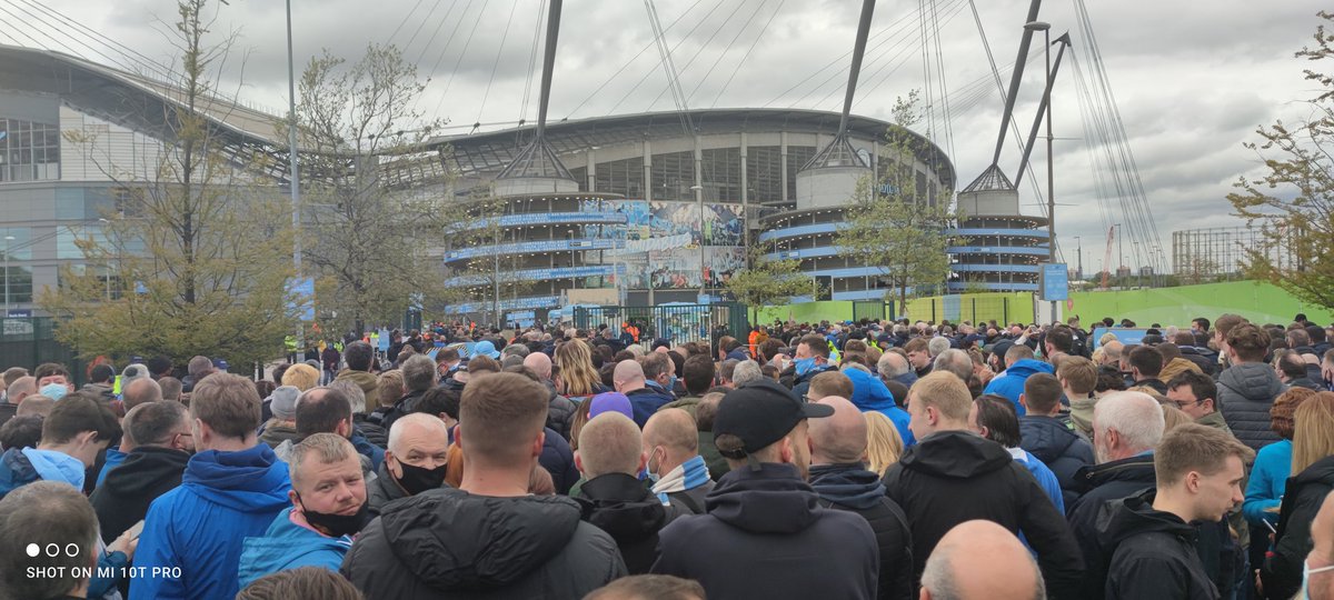 joemcfc94's tweet photo. @ManCityHelp so the idea of the 10,000 fans is to keep people distanced from eachother, yet you have pushed everyone into one entrance? https://t.co/WOeL2Z4WKh