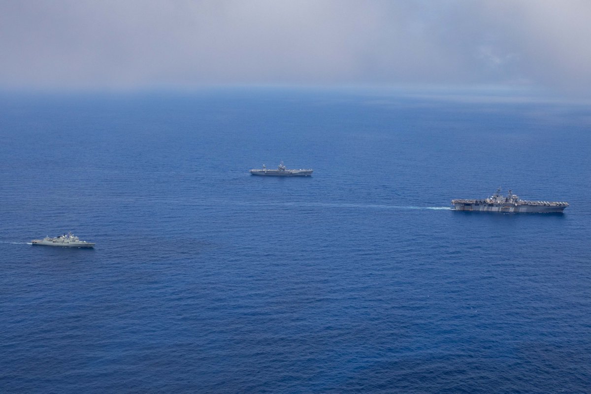 JFCNorfolk's tweet photo. @USNavy USS Iwo Jima @USSMountWhitney and NRP Alvares Cabral (F 331) transit in formation during @NATO’s joint and combined exercise #SteadfastDefender2021. https://t.co/iuphJ5vJ7s