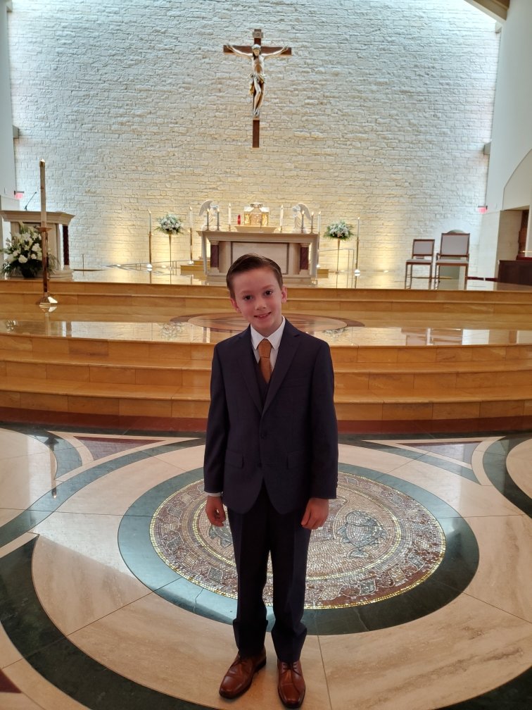 fixter25's tweet photo. @menswearhouse -Thanks for helping him look so amazing that the priest told him he liked his suit during the homily of first communion mass. https://t.co/pJE3kKGqDh