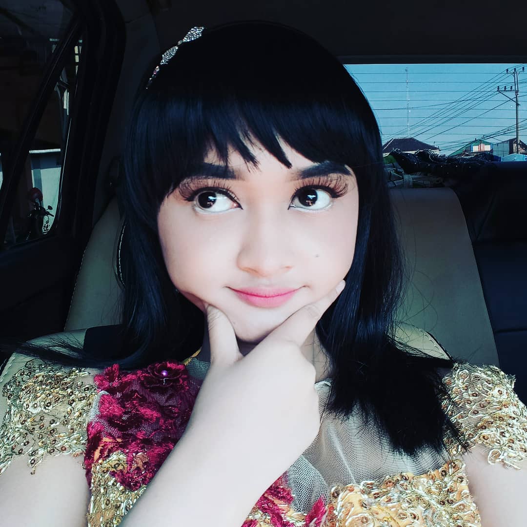 Dewi Yan singer official tweet media