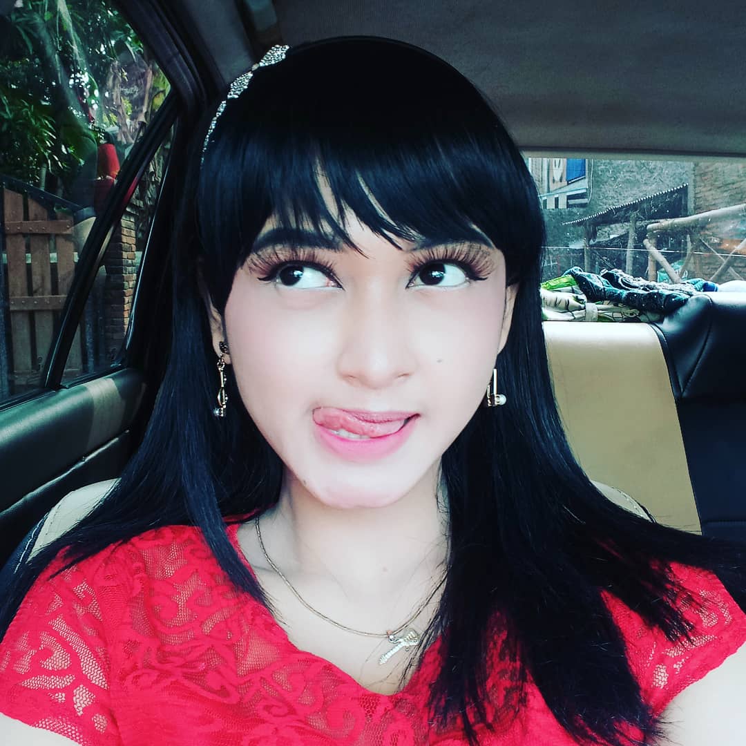 Dewi Yan singer official tweet media