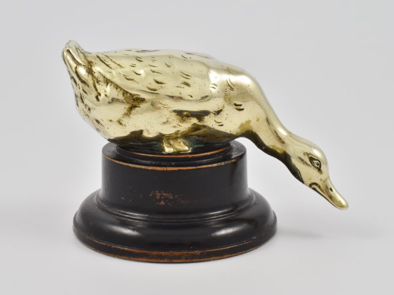 Check my goose.....
Early 20th century cast brass model of a goose- probably a paperweight.