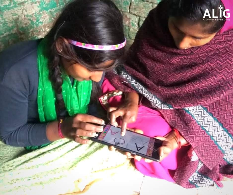 AligSociety's tweet photo. Ragini says the best thing to do during pandemic is to continue to teach my mother under #AdultLiteracyProgram. I am so grateful to have received this digital tablet under the where I along with my fellow friends are now able to learn and teach #DigitalLearning to our mothers https://t.co/T4dU1l9kDd