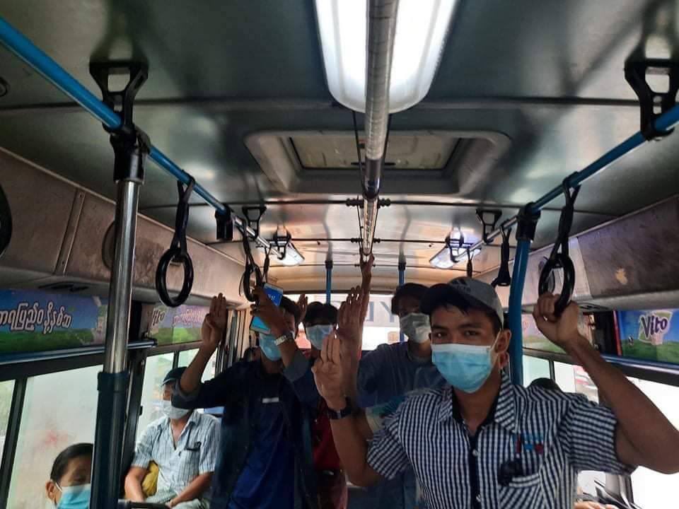 DMyintoo's tweet photo. Public transportation bus strike done by North Okalapa youths by raising three fingers salute sign to turn down military junta. #WhatsHappeningInMyanmar  #May24Coup #HelpKayah  https://t.co/dREeT4Vdsb