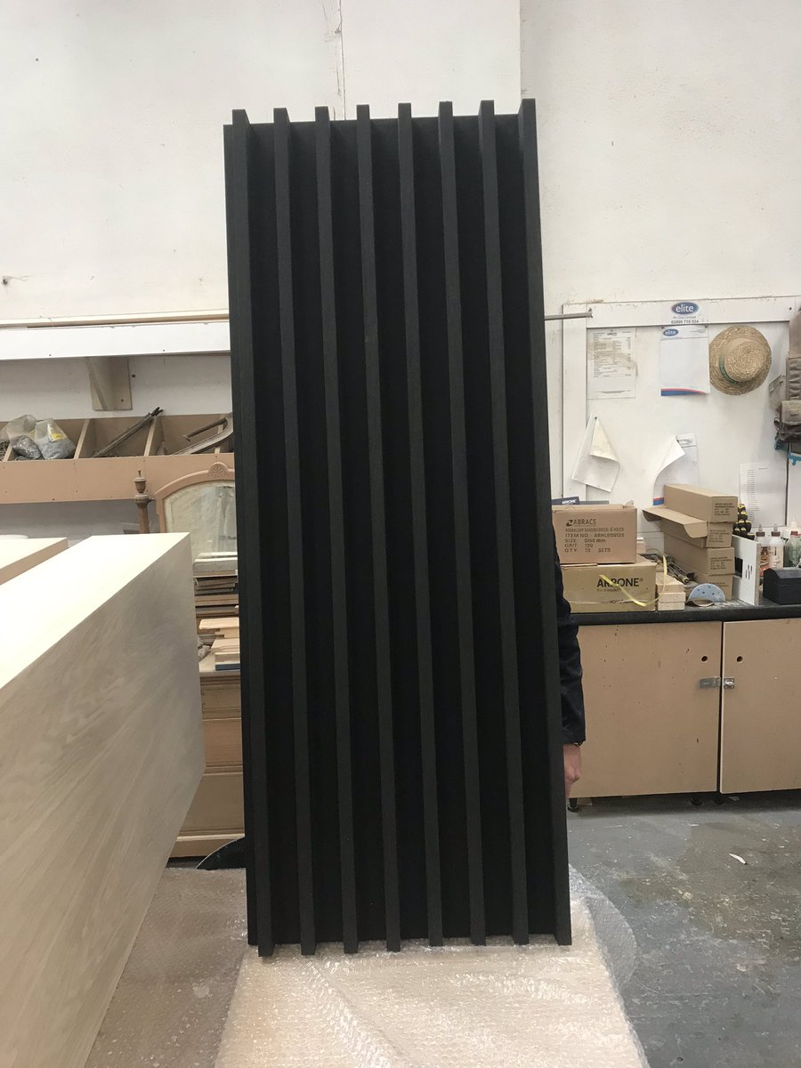 EliteConst1's tweet photo. Laying down the lacquer on oak veneered vertical timber battens for the ongoing bathroom project. https://t.co/WATih9YE2w
