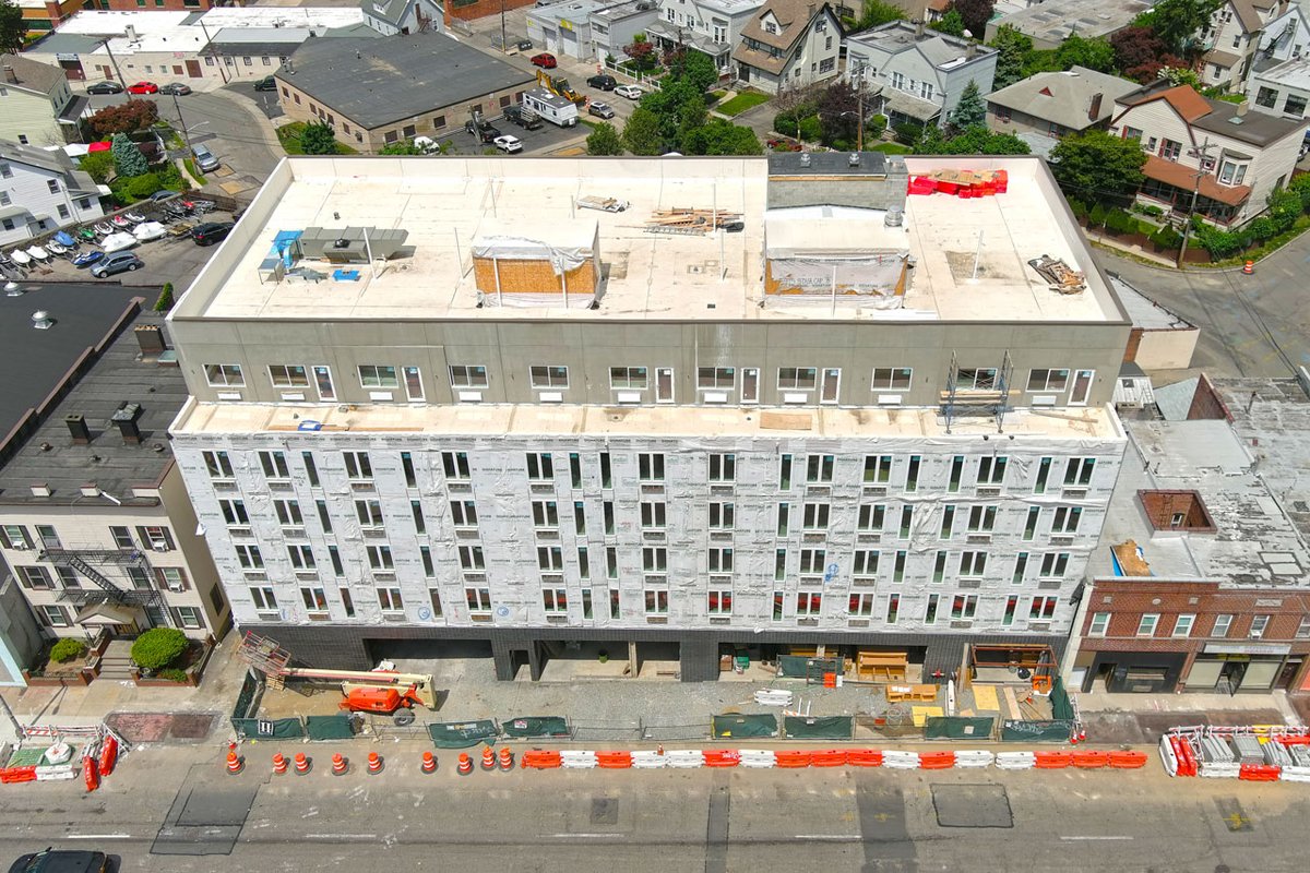 KarenHessel2's tweet photo. Six-story, 60-unit multi-family residential building - studios, 1-bed, and some 2-bed apts. parking garage on the ground level along with retail space. @DobanArch @TheHuguenotNRNY @frankchechile iridescent dark brick exterior on 1st flr @IdeallyNRNY https://t.co/WQnrHHWZDM