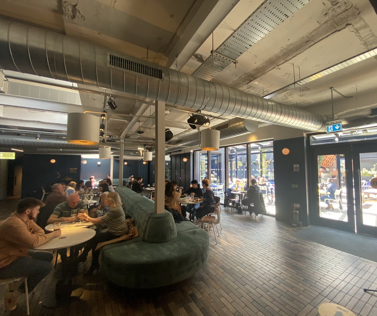 sophiemclaugh1's tweet photo. A sight that hasn’t been seen since before Christmas - people inside enjoying a lunch and a drink #BelfastisBack @BelfastLive https://t.co/fQkEro1XOD
