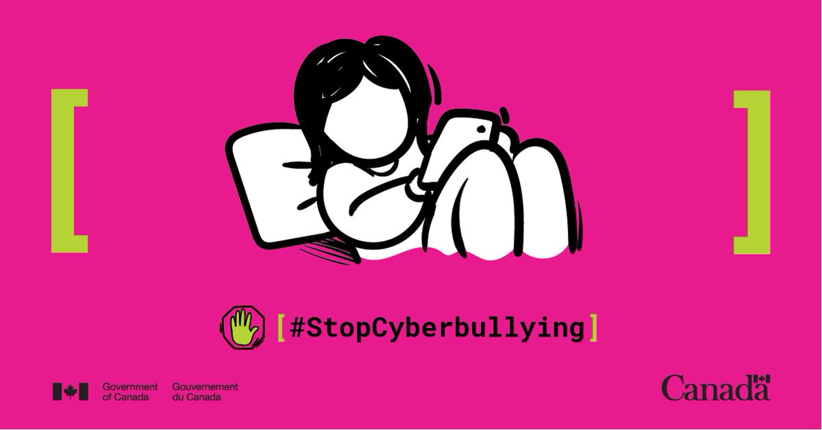 Image of girl on bed, with pillow behind her, looking at her mobile phone.