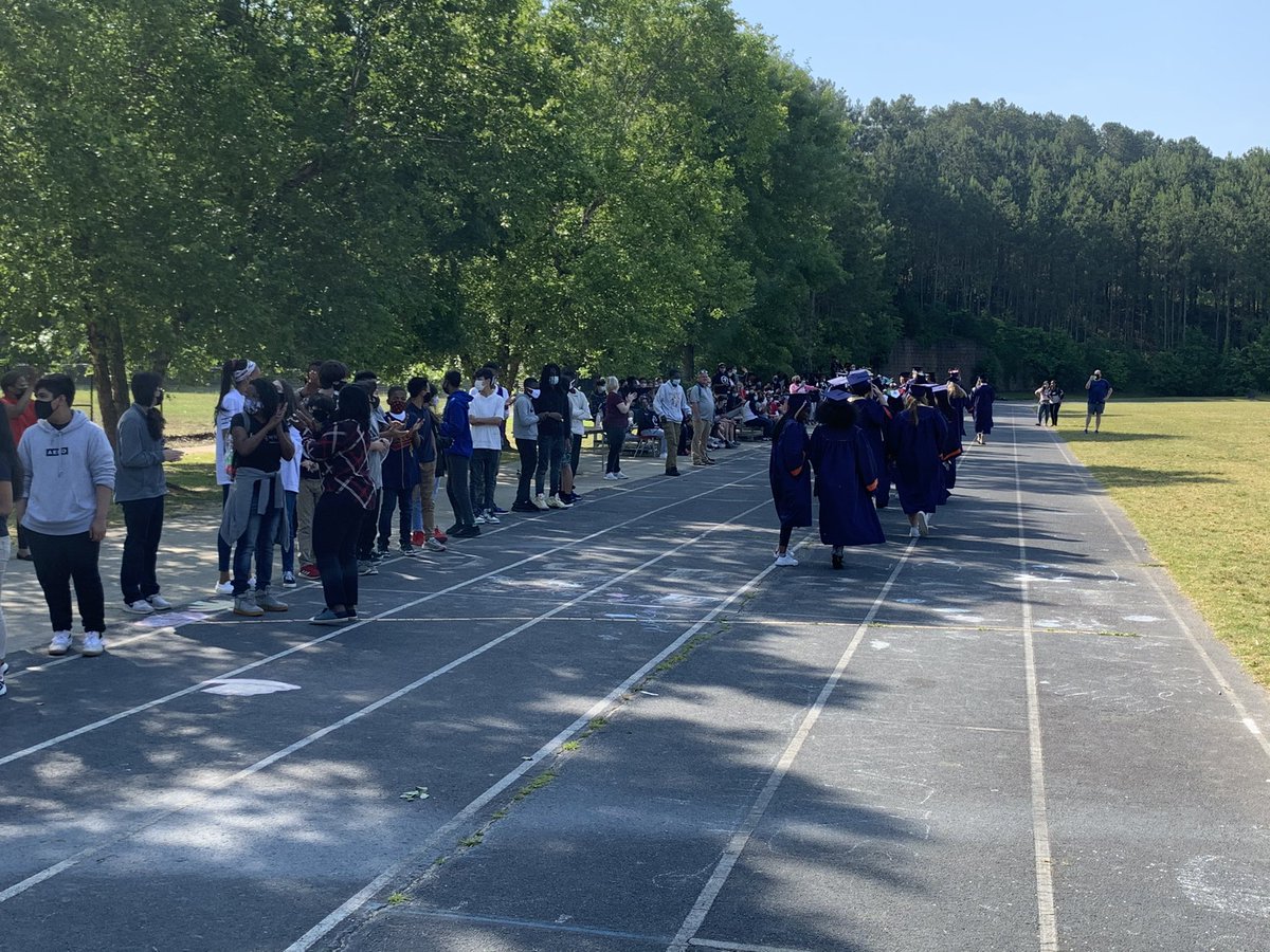 FCS_NSHS_Princ's tweet photo. The fun continues! Senior grads visit Sandy Springs Middle one last time in their caps and gowns! #NSHSClassof2021 #SpartanStrong @lhwoodruff @NSSpartans @erichollinhead @Jessbdale @Sheridan_NSCHS @KevinRo98947989 @juliabernath @SSCMSStallions https://t.co/tXevJACSpw