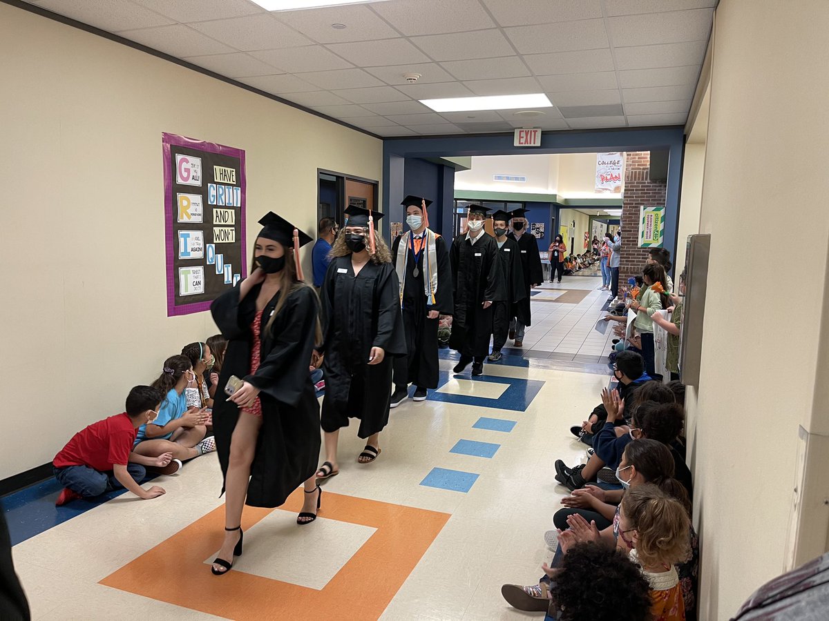 One last walk through the hallways of their elementary school..