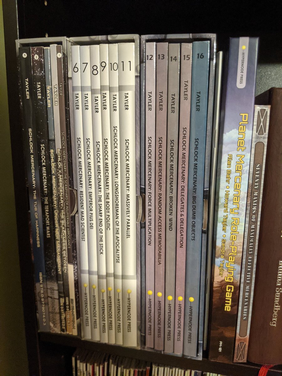 daniel_bart's tweet photo. My @Schlock shelf got a nice update today thanks to the awesome @howardtayler &amp; @SandraTayler https://t.co/TEVj149Wrr