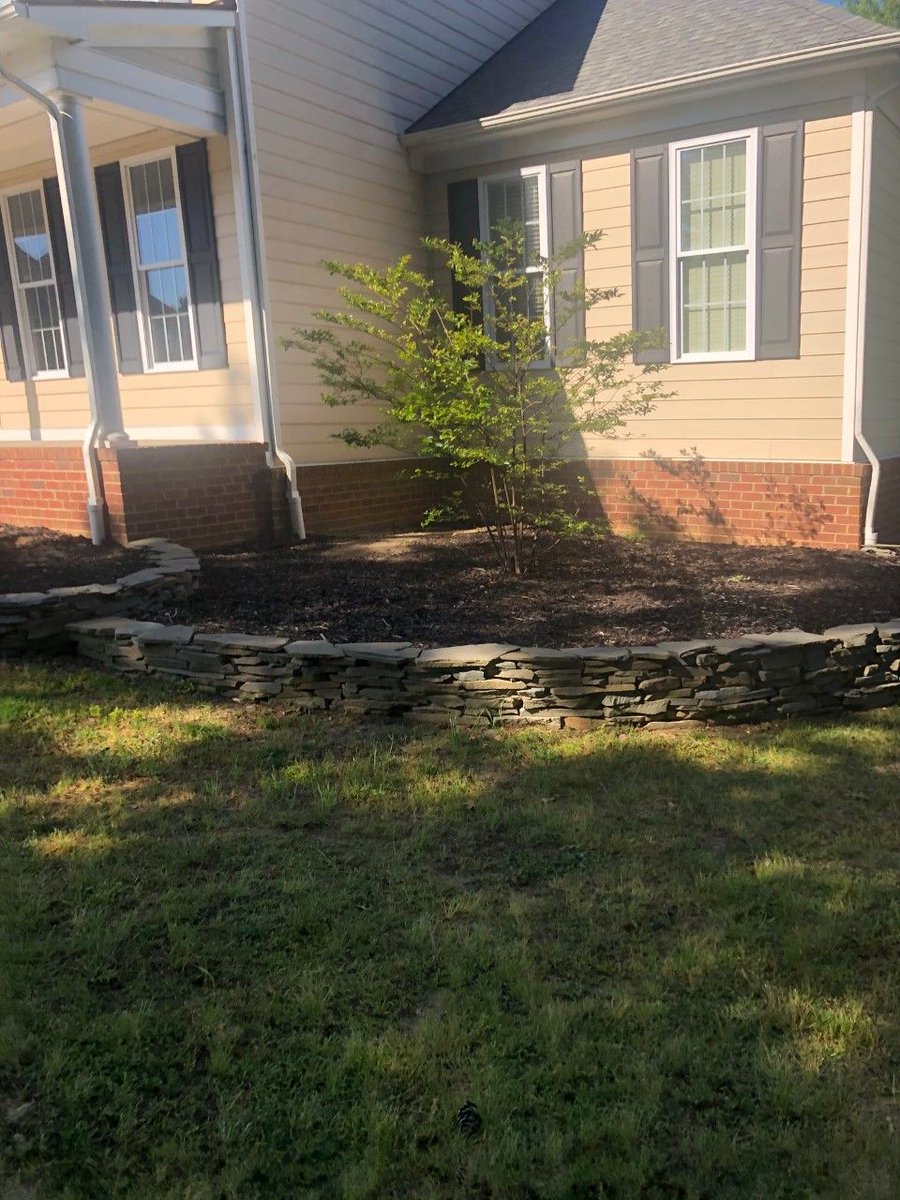 5Brotherslawn's tweet photo. The customer asked to repurpose existing plants but wanted new plants, too.  We installed boxwoods, arborvitae, lantana, lavender, rosemary among others and used black mulch to contrast the lighter stone edging.  What a welcoming look! #5BrothersLawnCare #LandscapeMakeover #Mulch https://t.co/vztxRCCmQw