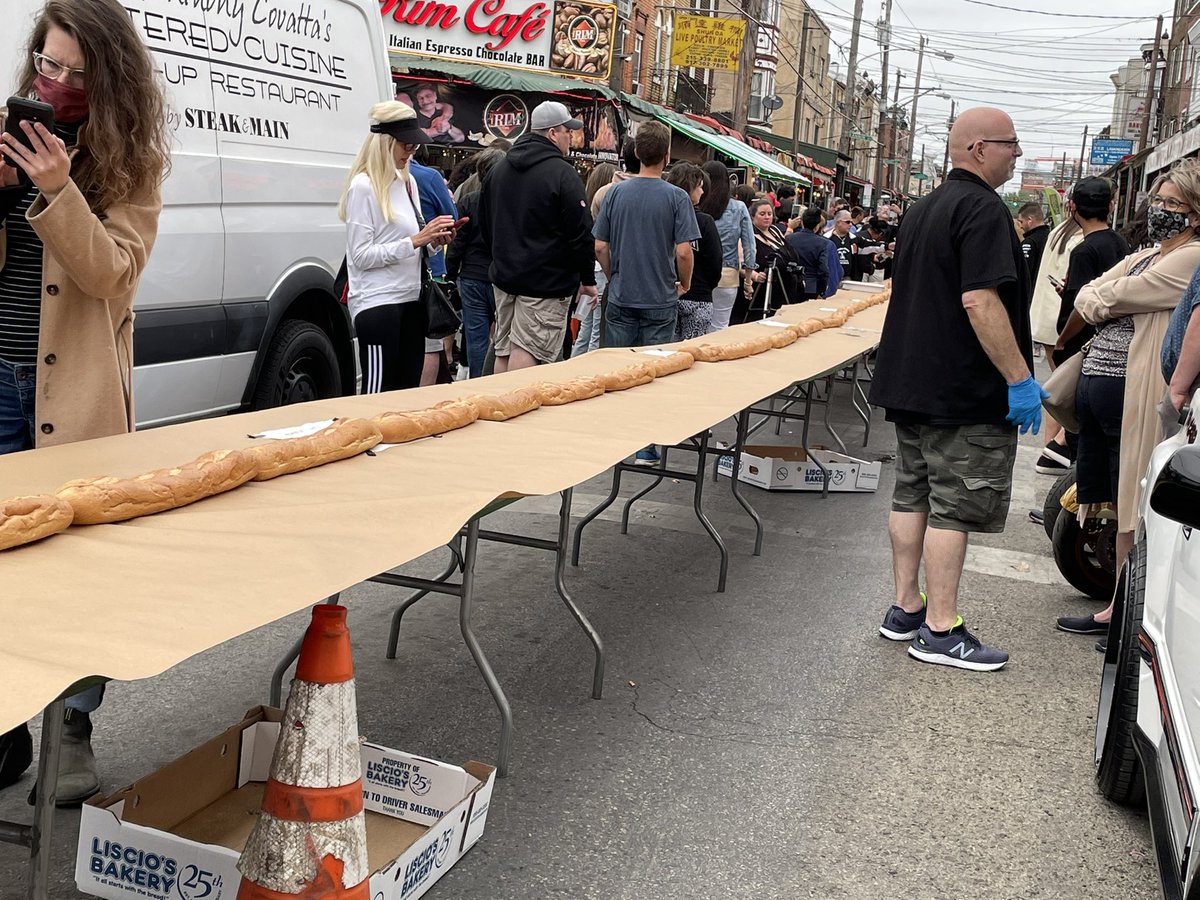 ProfDuff's tweet photo. They are constructing a 600 foot long cheesesteak down on 9th street in South Philly to beat a record of world’s longest... https://t.co/5U9RhT5StR