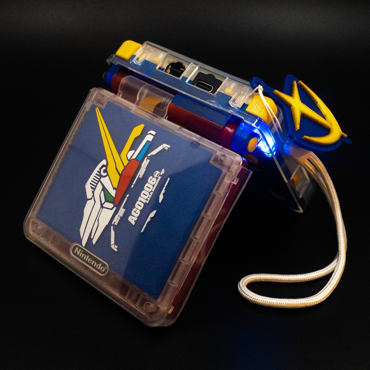 clockkeep's tweet image. Zeta Gundam MSZ-006 GBASP:
- Custom Red/Blue/White Housing w/ various Decals and Clear TPU Case.    - Yellow Buttons/Triggers. - White Strap &amp;amp; Earth Federation Charm. - Blue “On” &amp;amp; White “Charging” LEDs. - Makho Rechargeable Battery Mod. - USB-C Charge Port.