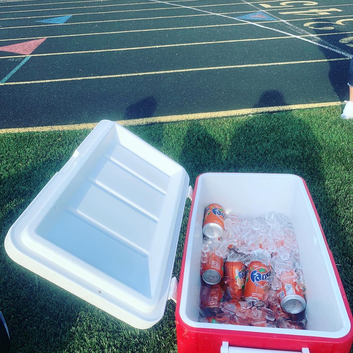 WPCPXC's tweet photo. Beautiful day at @EPHS_XC_TF . What a blast to be able to coach track with 3 fellow @XctfYork @YorkD205 Alumni coached teams. Ice cold Fanta for event winners! HOW SWEET IT IS. (Fanta was colder than a well digger’s a** in the Klondike at midnight!) #tradition #thelonggreenline https://t.co/K5Z3bcE8AQ