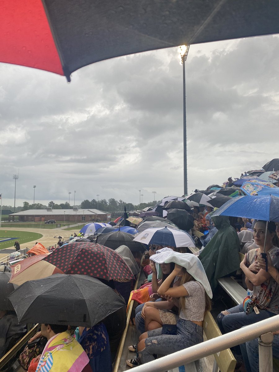 nursepmilli's tweet photo. They say when it rains on your wedding day it is good luck.  I’m thinking the same holds true for graduation.  Congratulations class of 2021.  👩‍🎓 👨‍🎓 #lakecreeklions #bestyear3 #Classof2021 https://t.co/N1ibM59a7N