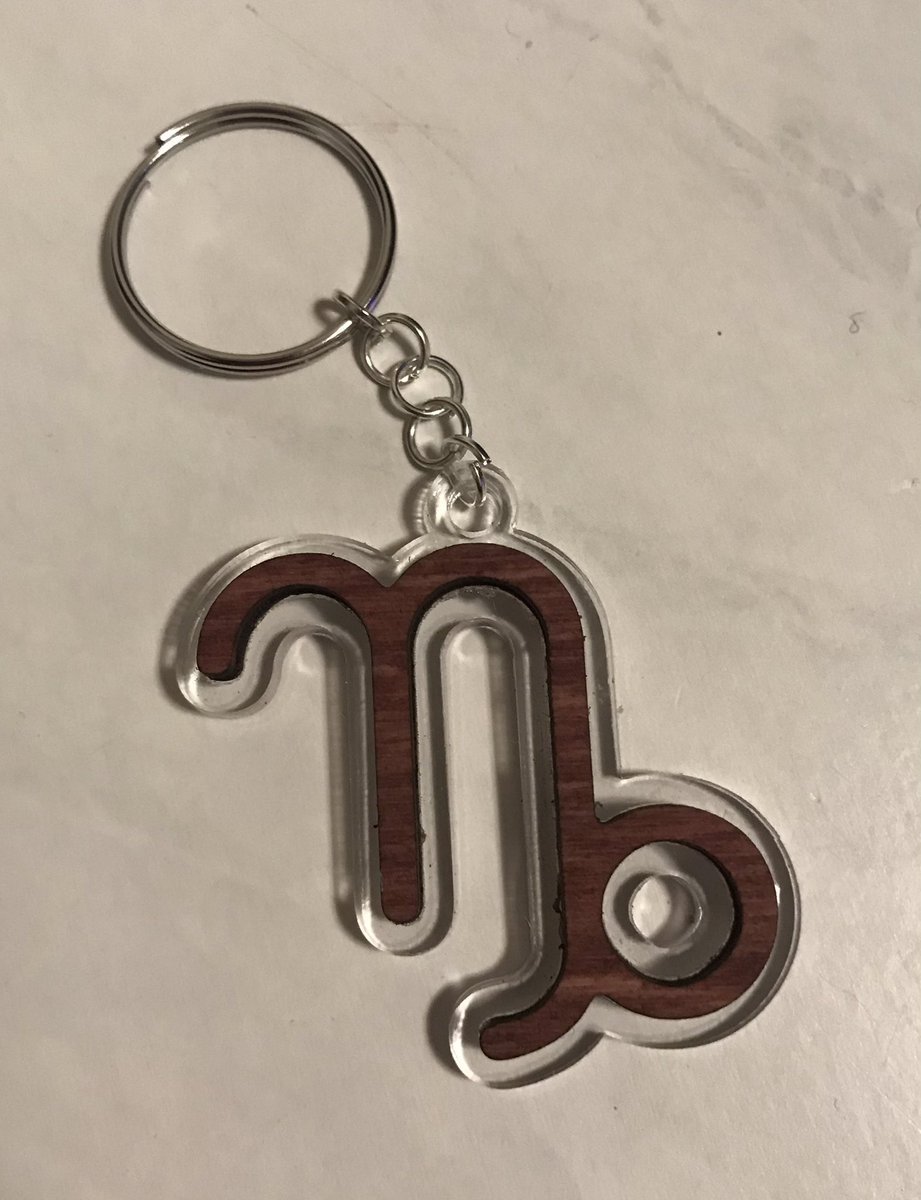 PeachesbytheSea's tweet photo. Tonightβs adventure was this #Zodiac keychain. Initially I planned to do two colors of acrylic, but opted for a nice wooden inlay.
#glowforge
#laserfun
#lasercraft
#Capricorn https://t.co/gpqHn053sH