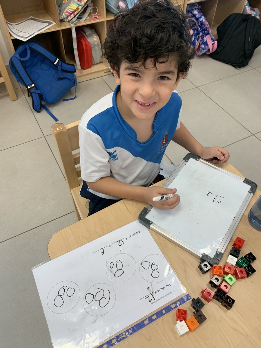 Today in Maths we learnt to find a quarter of a number by splitting the whole number into 4 equal groups. We started by using cubes to do this and when we became more confident we moved on to drawing. We love fractions! <a href="/KCD_Year1/">Year 1 @ Kent College Dubai</a>