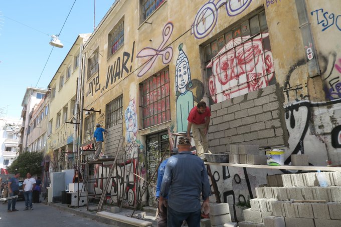 CTsoutsi's tweet image. The self-organized theatre #Empros in #Athens has been evicted by the cops. Fascism reigns the country that invented democracy! You will ban culture with cement and people will break the cement with music! And we will sing and talk and play and be free. #Solidarity #SaveTheatre