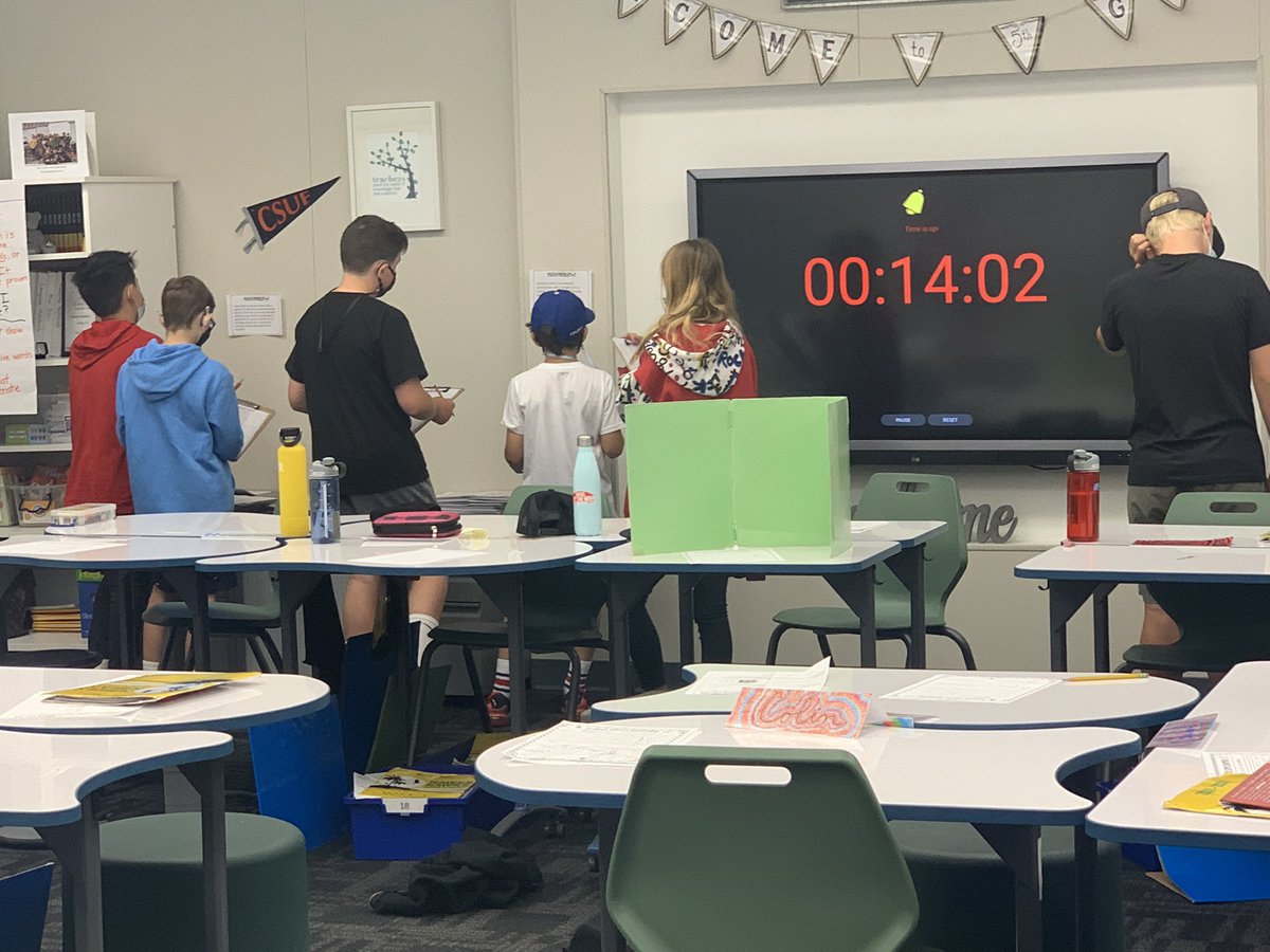 Haweselementary's tweet image. This class is doing a gallery walk to solve different math problems.  I don’t think I have ever heard them this quiet! #thinkinghard #behawesome #movementandmath #hawesnation