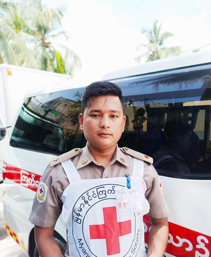 MyanmarRedCross's tweet photo. Hein Latt Naing is one of thousands of #RedCross volunteers who have been providing lifesaving #firstaid and running ambulance services in response to the political turmoil in #Myanmar. Read his story here https://t.co/S7vlXEGDu5. https://t.co/HfUSvy3MXK