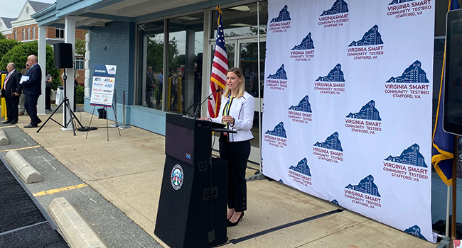 staffordvagov's tweet photo. Chairman Crystal Vanuch addresses the crowd today at the ribbon-cutting ceremony for the new Virginia Smart Community Testbed, next to Stafford's Gov. Center. It is the first of its kind in Virginia and will test new technologies in a real-world setting. #smartCIT #goStafford https://t.co/CqU6Ucs560