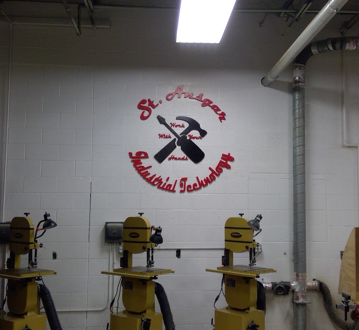 STAIndTech's tweet photo. Thanks to Eli Heeter for cutting our logo on the CNC, painting, and hanging our logo in the shop. https://t.co/S8oH4RMNJj